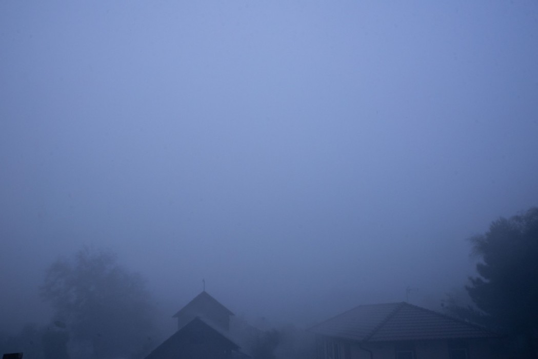 Fog and houses weather